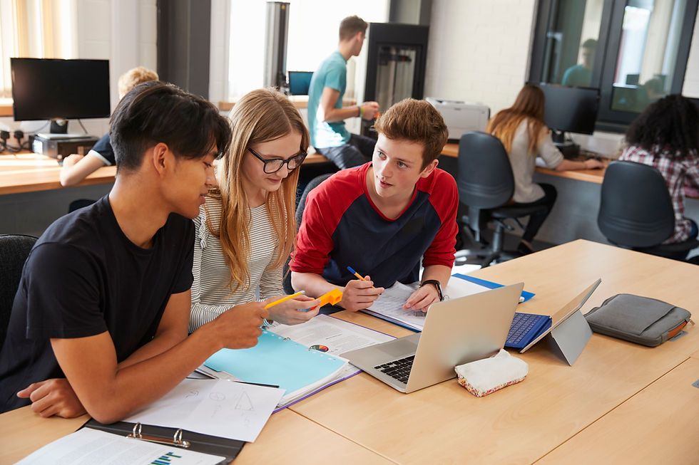 students collaborating on a class project