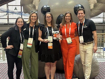 Amanda Padilla and Team pictured at NatCon25