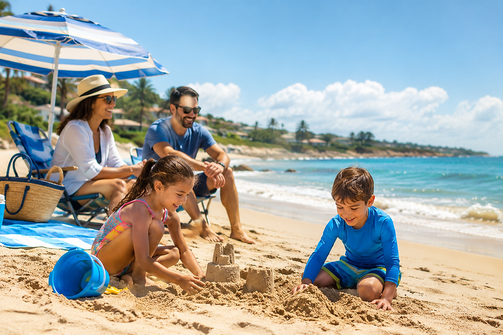Happy family builds a sandcastle on a sunny beach, with smiling parents under a blue-and-white umbrella.