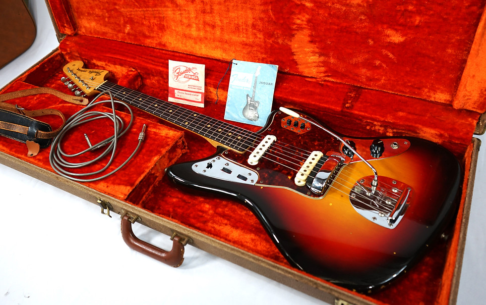 Early 1962 Fender Jaguar 9 hole guard