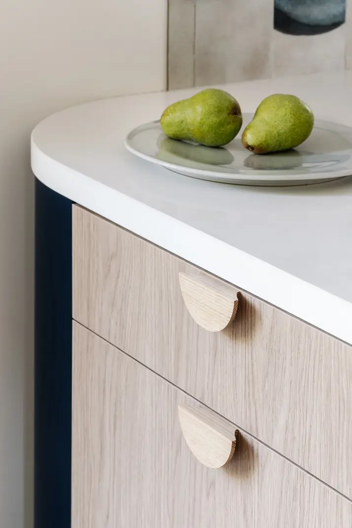 Detailed photo of the curve cabinet in an old Red brick home