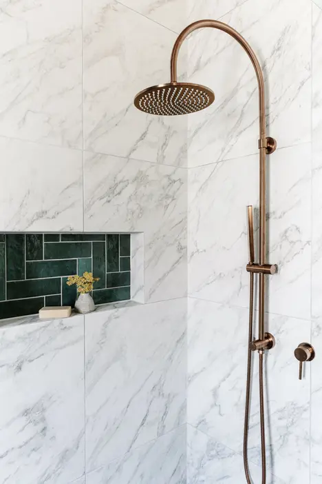 A picture of shower in an old red brick house