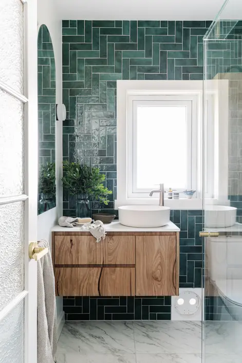 Picture of ensuite blended old-fashioned charm with modern style.