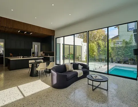 Luxury indoor living overlooking  pool