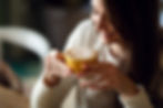 Happy woman enjoying a cup of fresh coffee