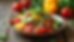 Close-up view of a colorful summer vegetable salad with tomatoes, cucumbers, and bell peppers