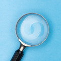magnifying glass on white table_edited.j
