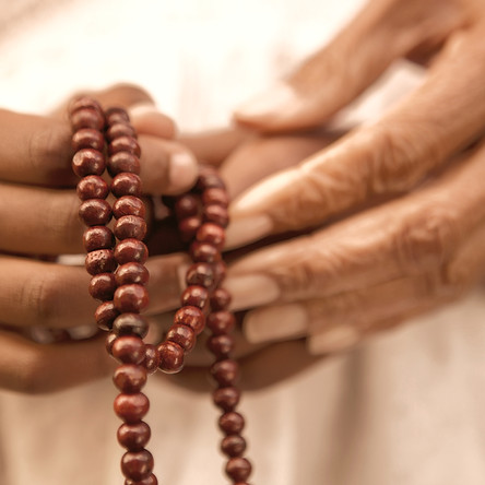 Holding Wooden Beads_edited_edited.jpg