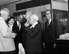 David Ben-Gurion visits Yitzhak Ben-Zvi at the presidential hut in Jerusalem and receives an explanation concerning the Judean Desert finds. From right to left: Joseph Aviram, David Ben-Gurion, Yitzhak Ben-Zvi, Yigael Yadin, Rachel Yanait Ben-Zvi, Pesach Bar-Adon