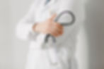 portrait-friendly-doctor-isolated-gray.jpg