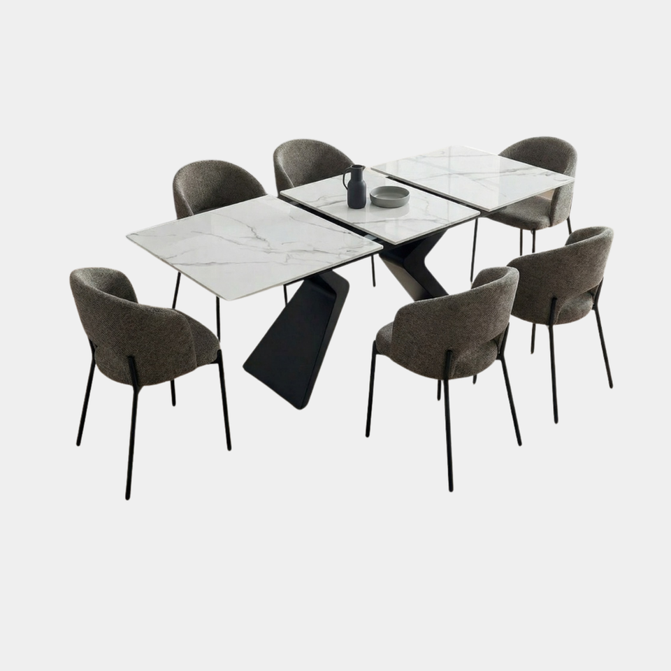Mesa porcelánico extensible blanca con patas negras para comedor moderno.