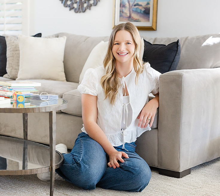 About Tarah Vosseler MS CCC-SLP sitting in a living room