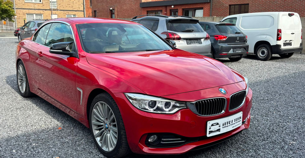 BMW 420i Luxury Line Cabrio Hardtop 184 pk 2015 vooraanzicht met elektrische hardtop en luxe uitstraling