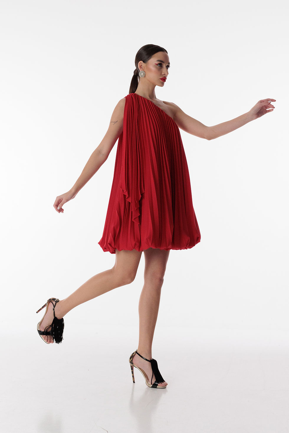 Lady in red bubble dress designed by Repulo's Atelier