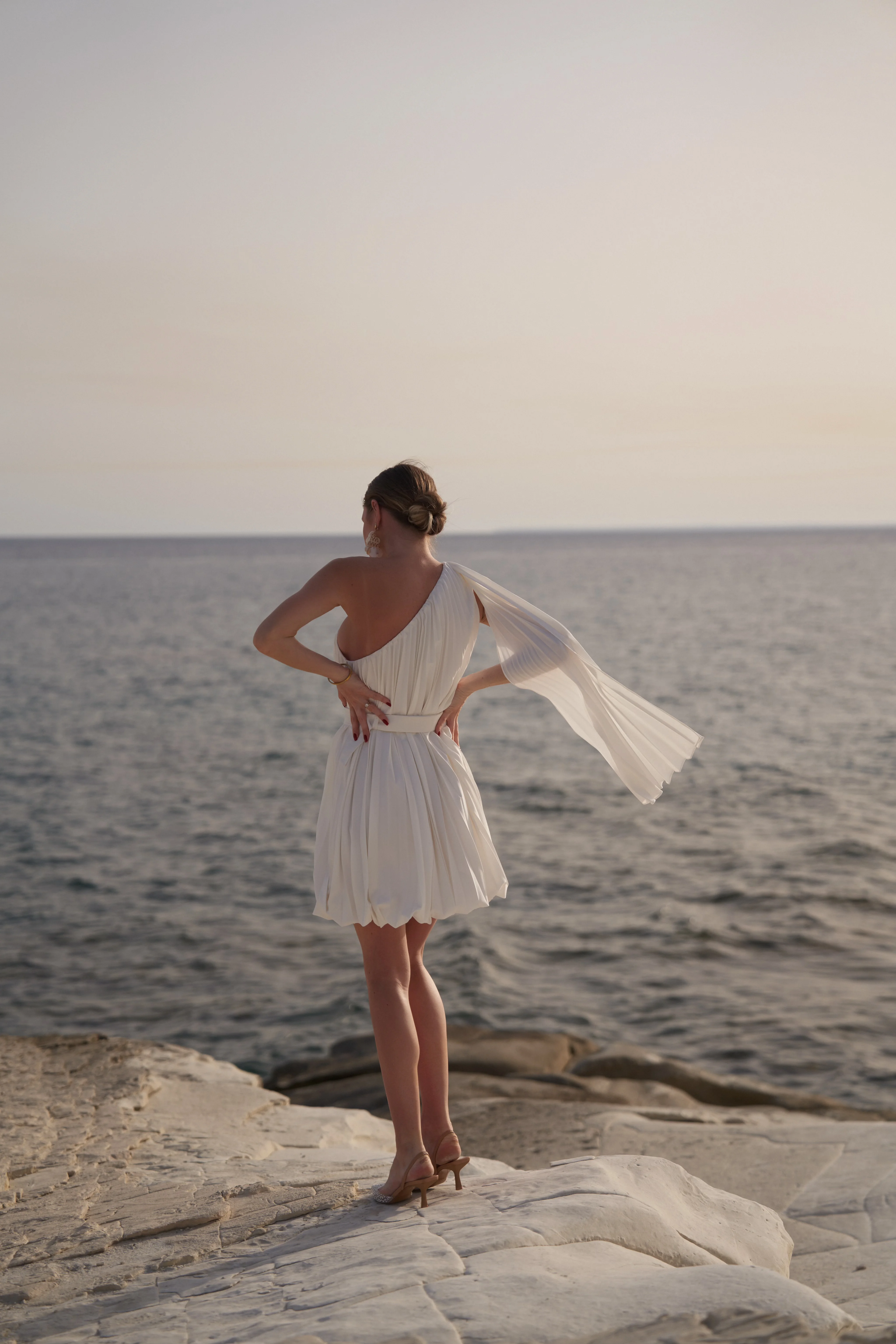 Luxury vacation Europe outfit bubble hem mini dress Bon bon fashion forward resort style