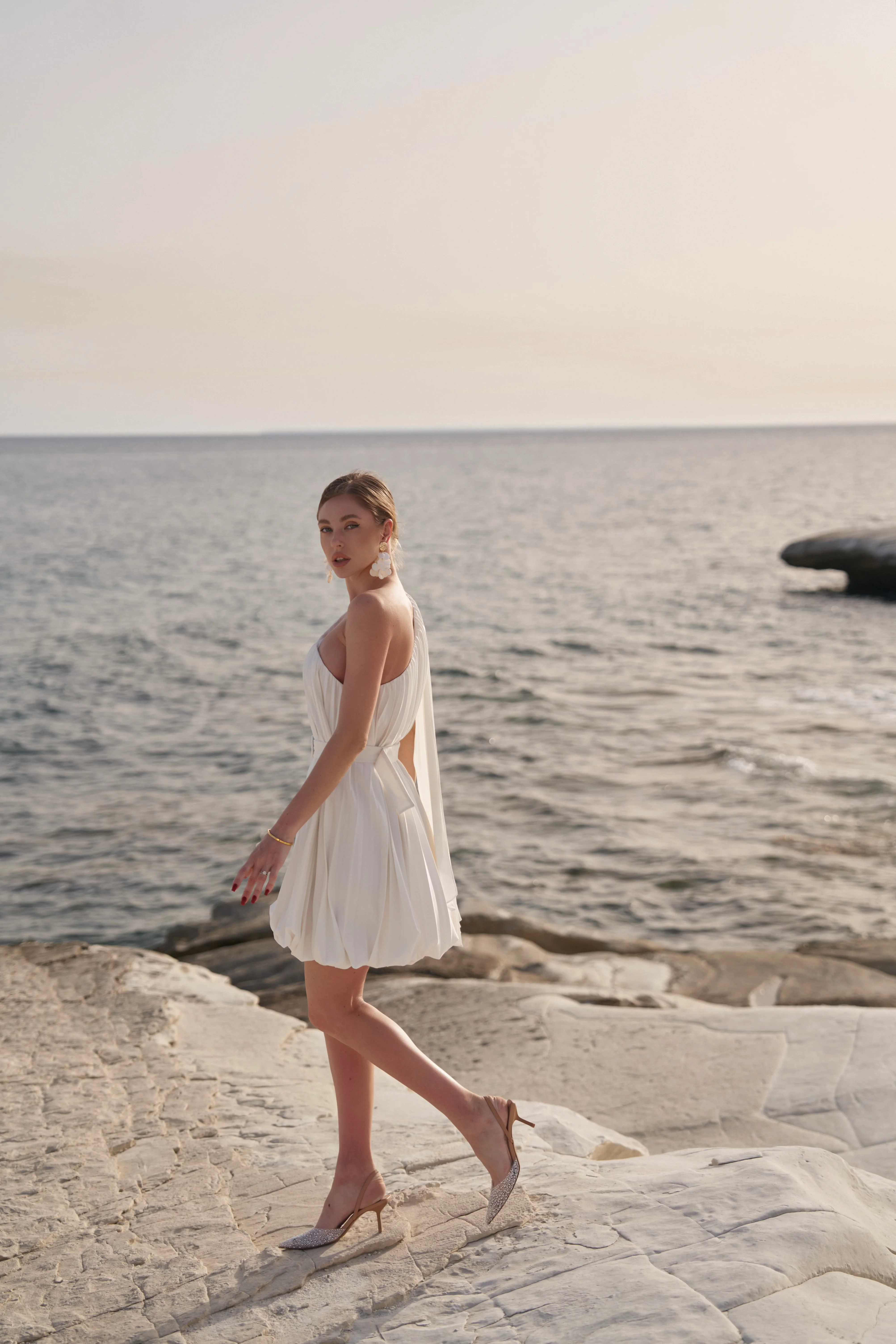 Ibiza vacation outfit idea bubble hem mini dress Bon bon resort wear Europe