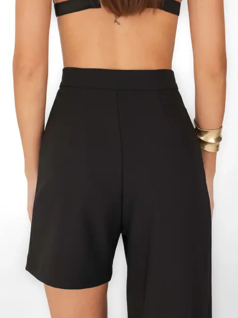 Close-up of back on one-leg trousers