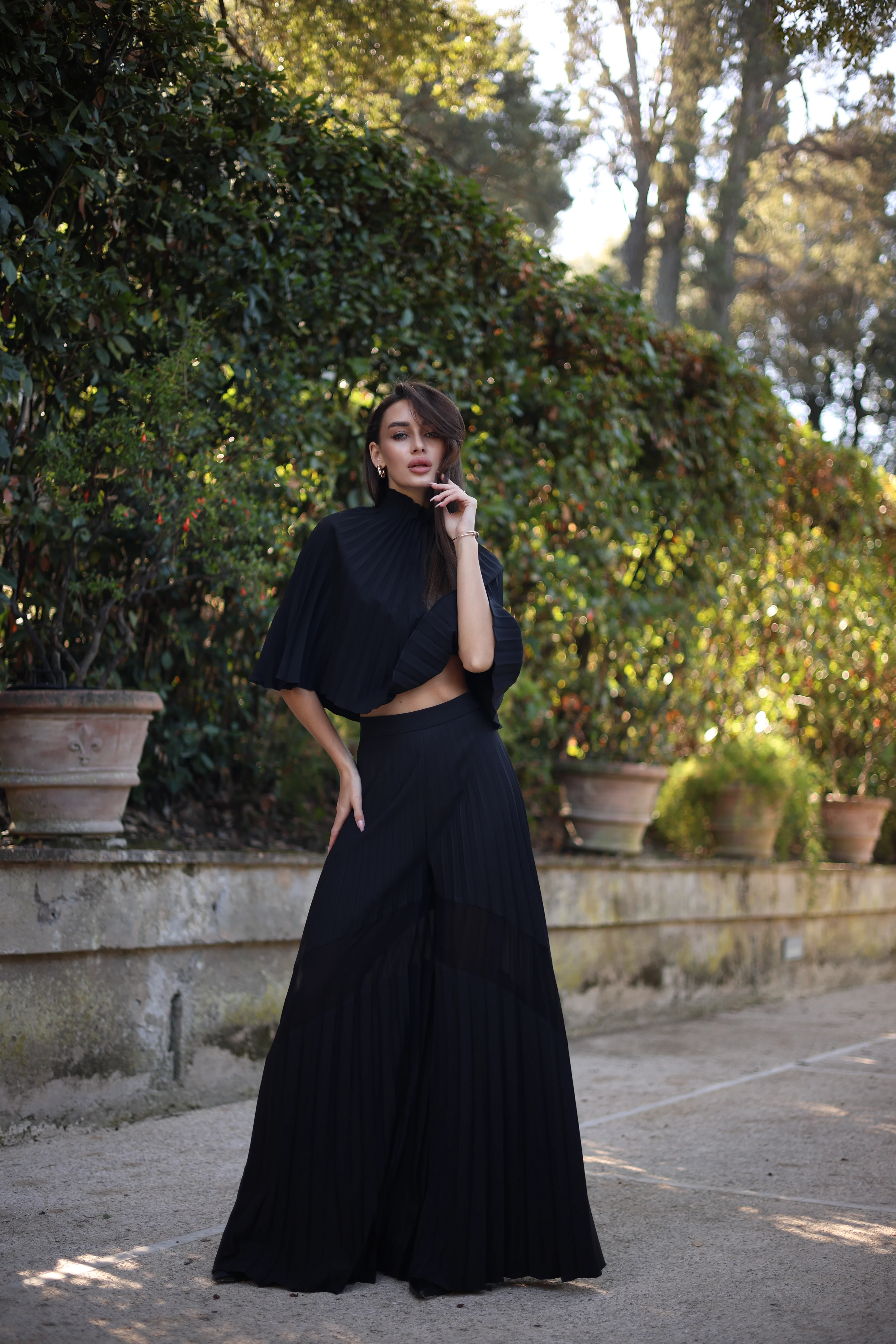 What to pack for a luxury vacation in Europe pleated wide leg trousers Shell outfit idea