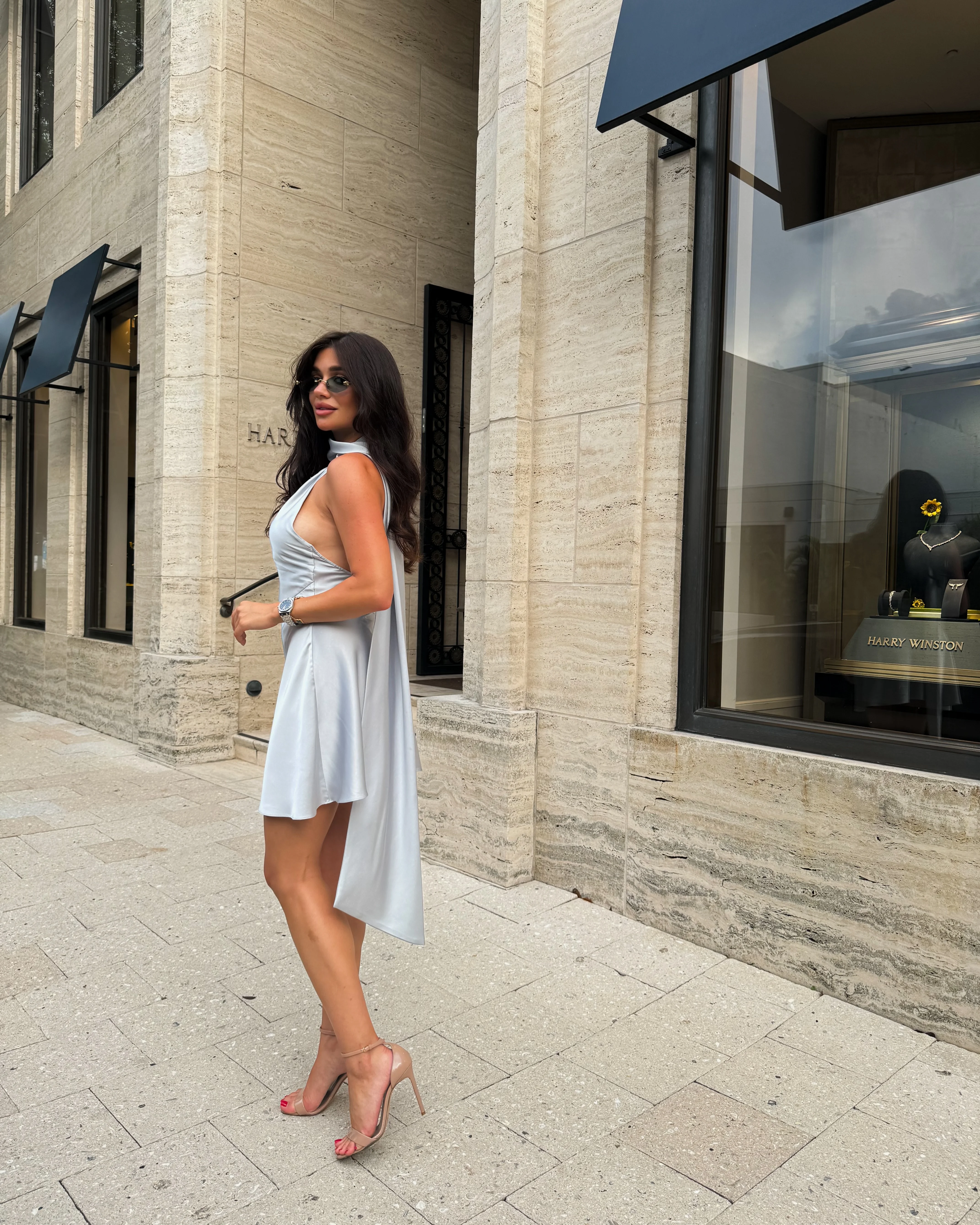 French Riviera vacation outfit idea satin halter neck mini dress Bree elegant style