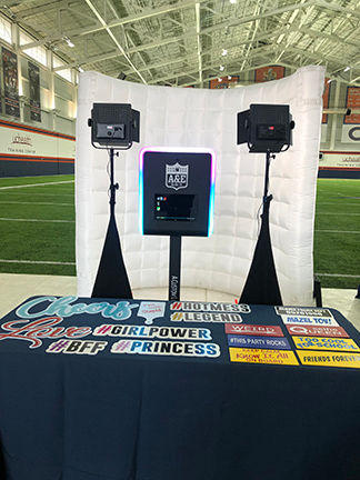 Flip Book setup setup with a table displaying colorful hashtag signs.