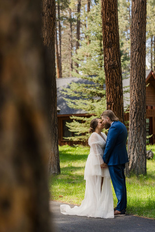 Candid portrait of bride and groom during FivePine Lodge wedding in Central Oregon.