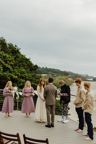 Ceremony during Seal Rock elopement in Oregon