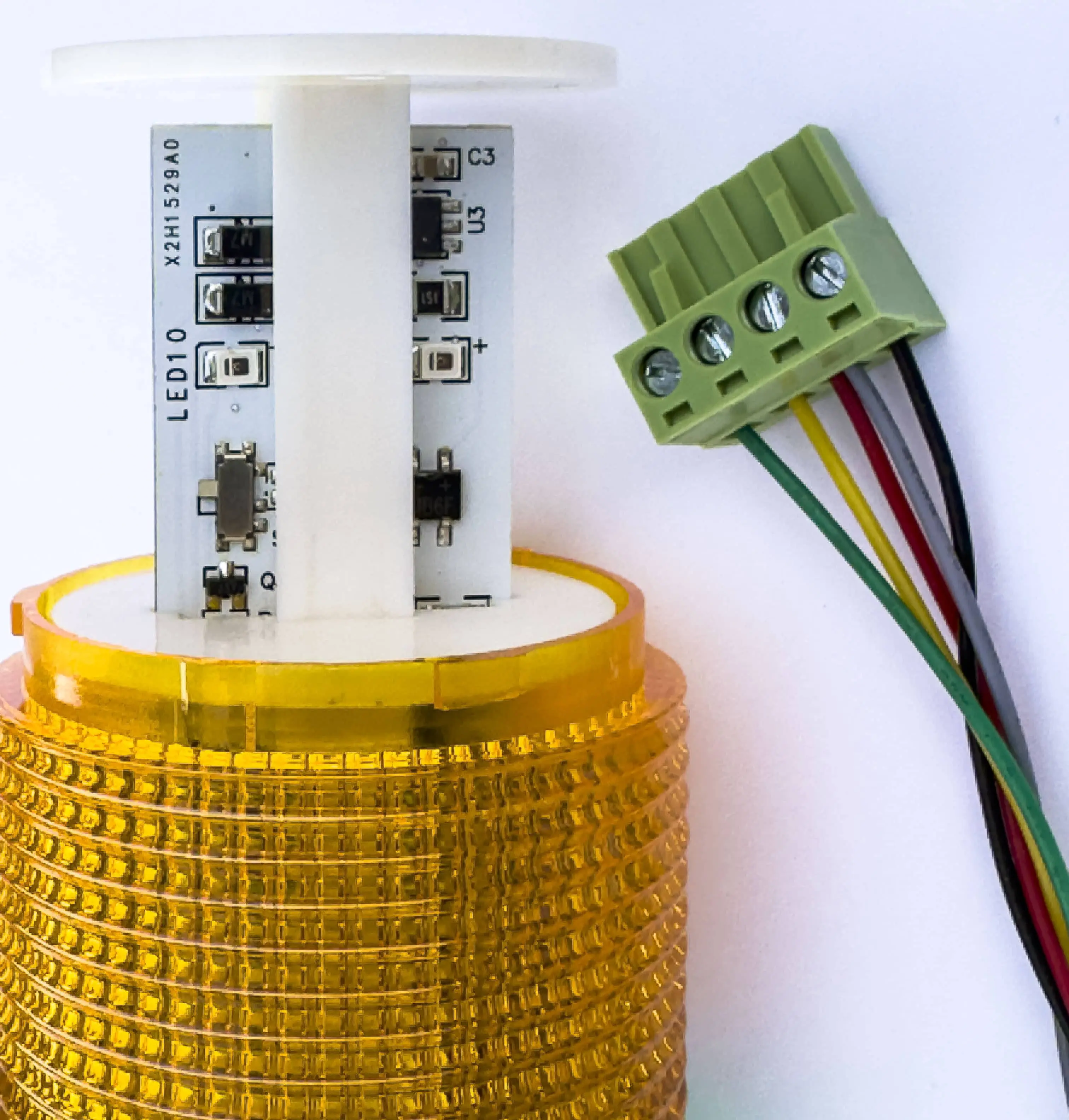 Twist LED light cover counterclockwise to access the steady/flashing light selector