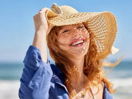beautiful woman smiling at the beach