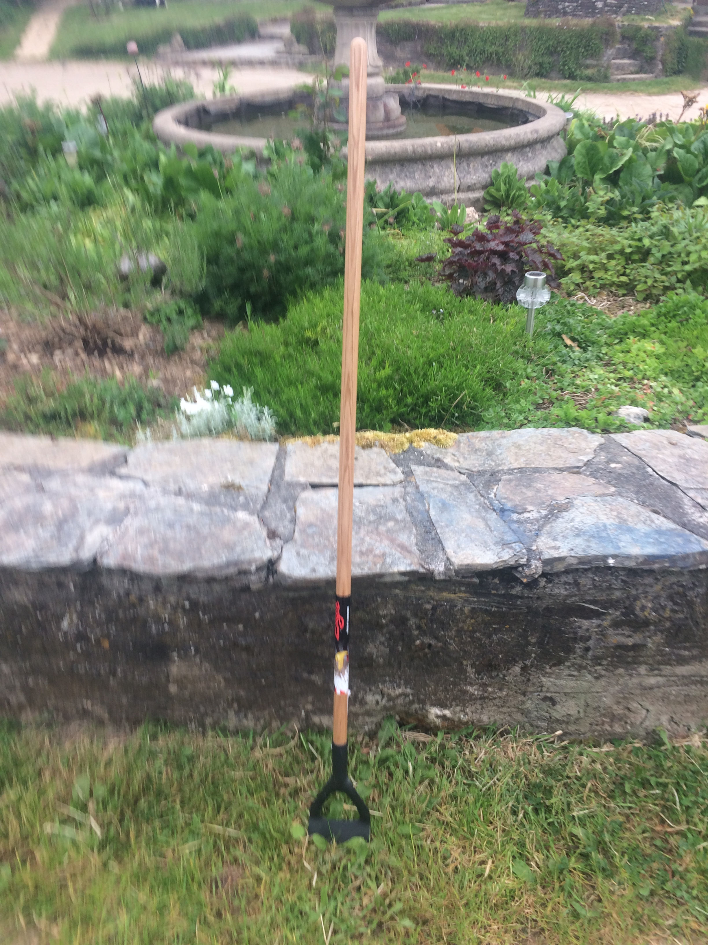 Gardening hand tool with wooden handle