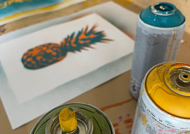 spray cans and stencil