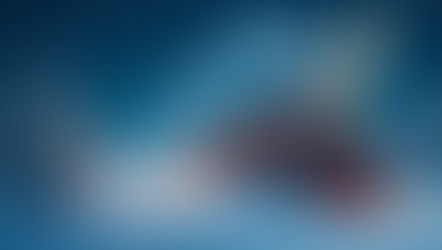 vlak jede zimní krajinou