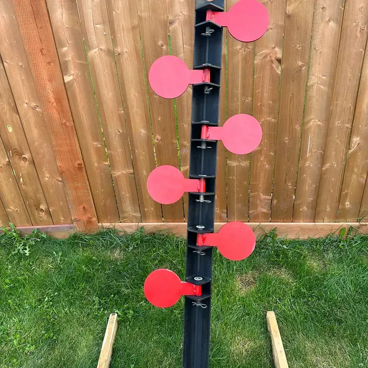 Shooting target stand with red paddles