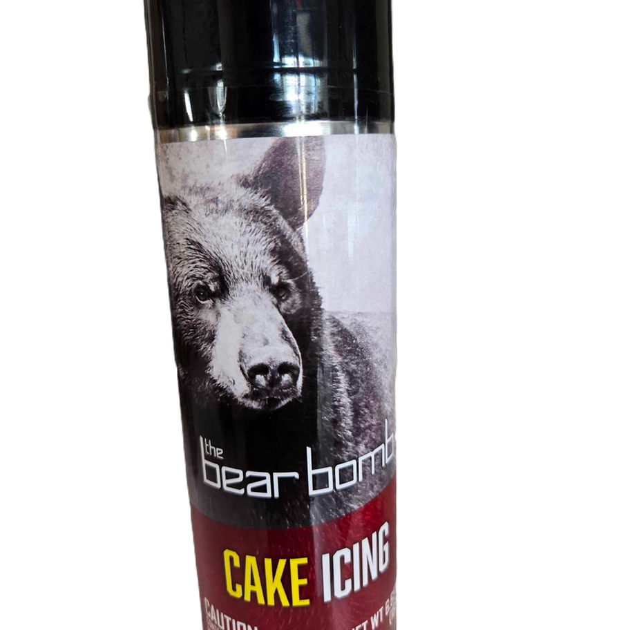 Black spray can with bear graphic and 'bear bomb CAKE ICING' text