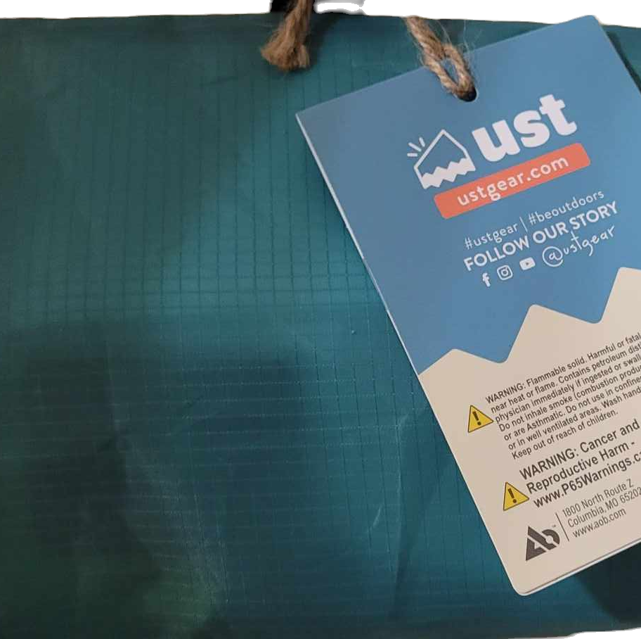 UST Gear product tag with warning text