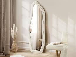 Le Pouvoir des Miroirs en Décoration d’Intérieur : Illusions, Lumière et Élégance