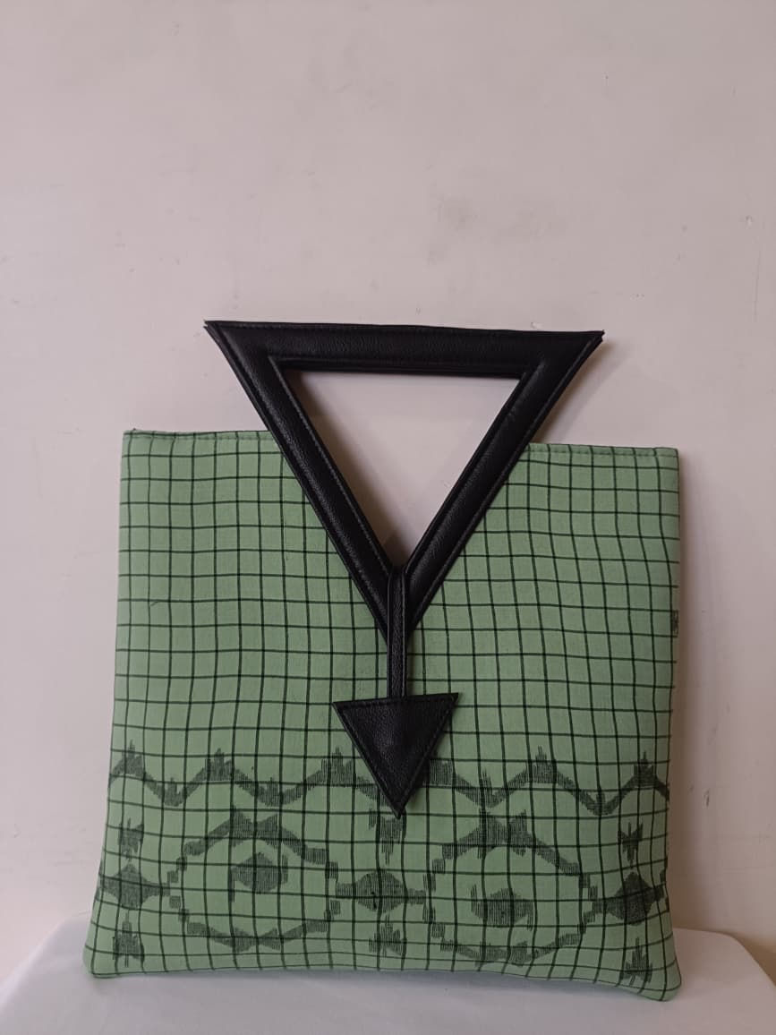 Bag: Green colored jamdani handbag with black triangular handle