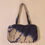 Thumbnail: Bag: Blue cotton tie-dye bag with Kantha-embroidered pocket