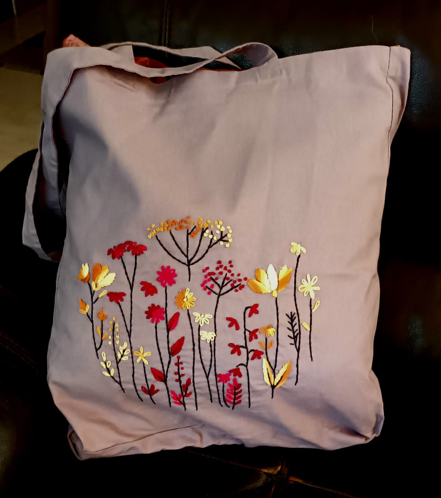 Bag: Gray cotton shoulder bag with flowers embroidered in red, black, yellow