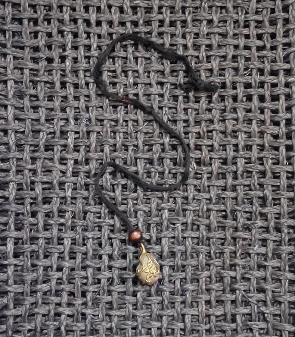 Accessory: Necklace with bronze-on-pebble pendant