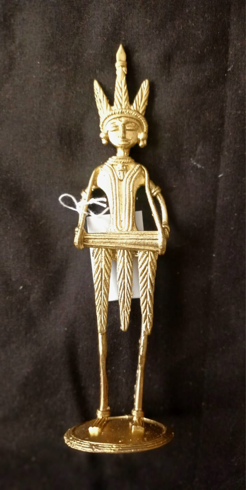 Table decor: Antique gold Dokra (non-ferrous casting) wandering lady minstrel