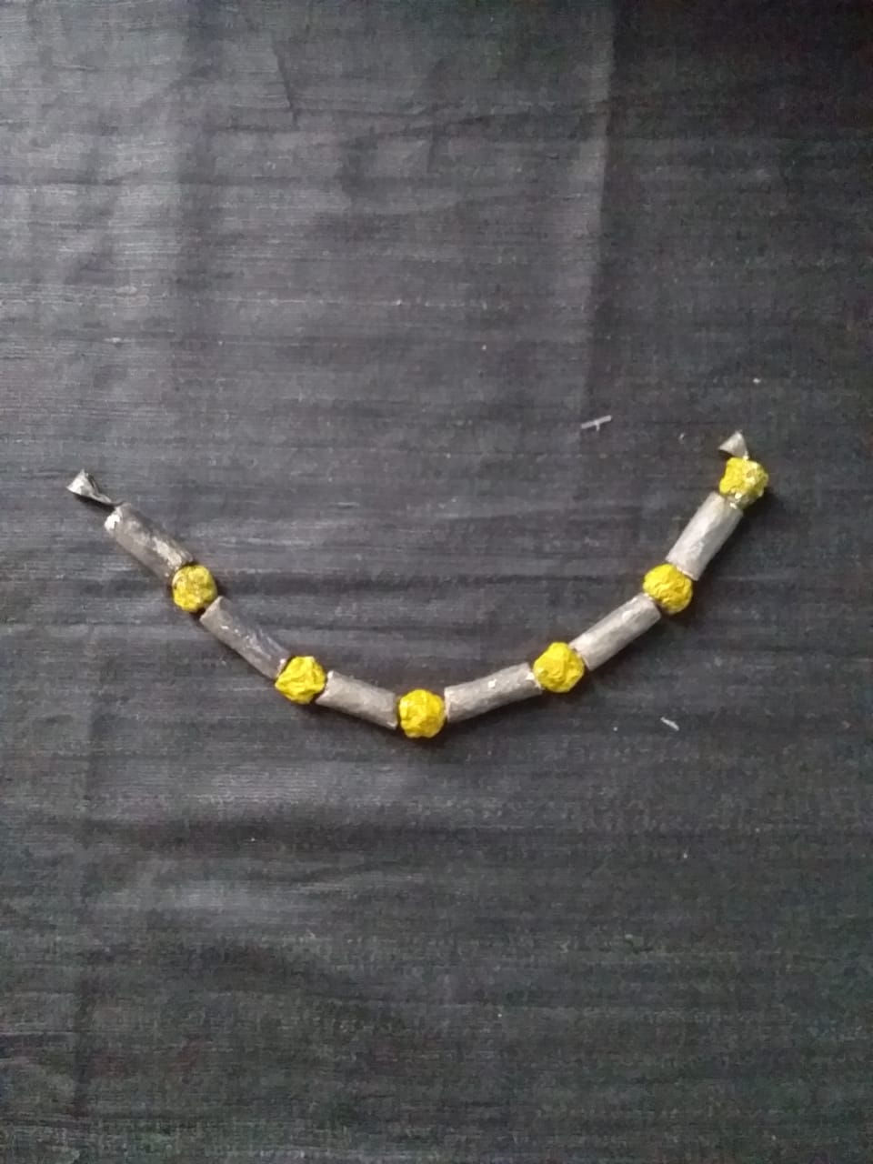 Accessory: Wood-mache necklace in grey and yellow