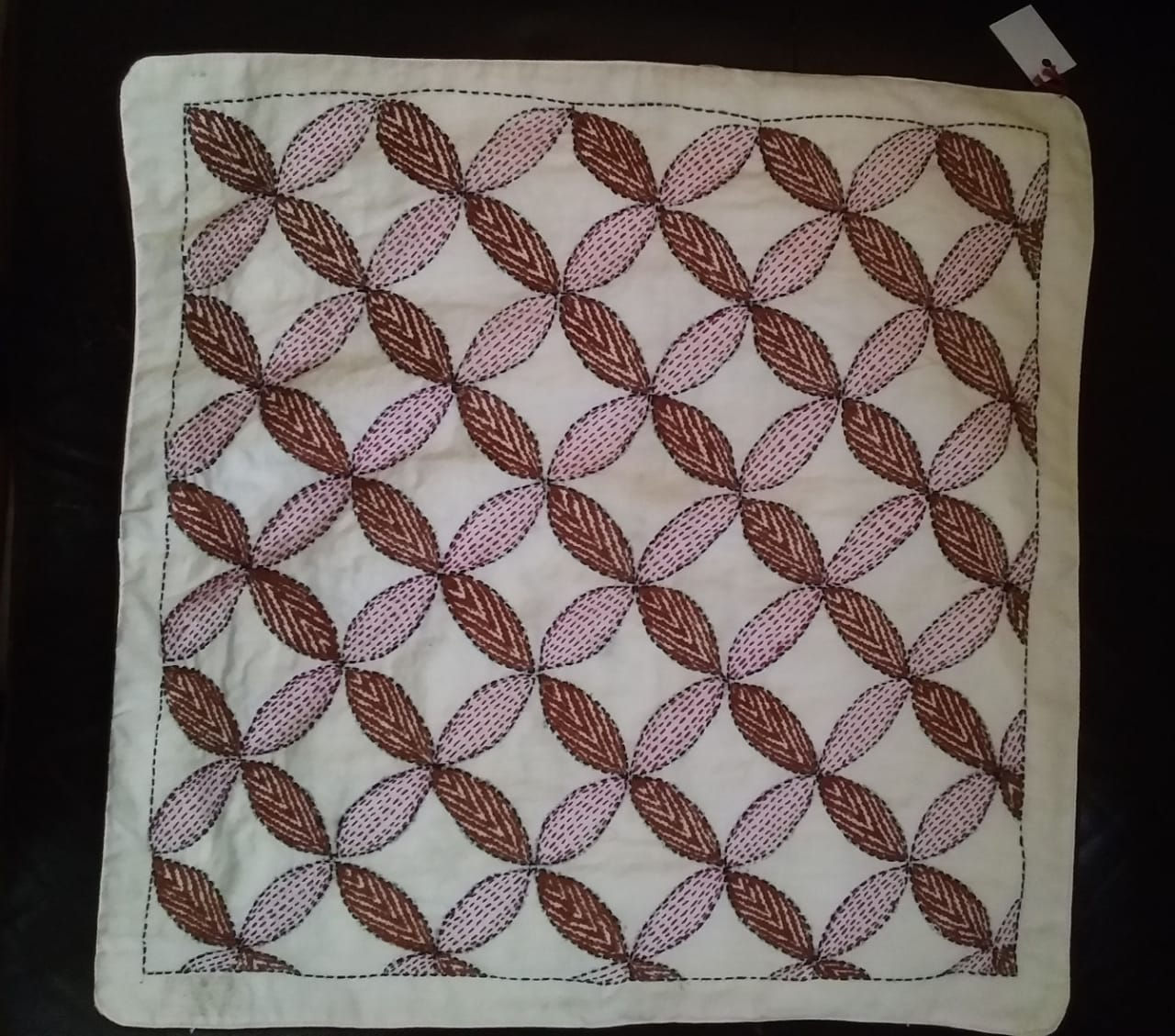 Accessory: White cotton cushion cover in brown, maroon & black Kantha embroidery
