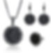 Silver necklace, earrings, and ring set with black stones