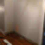 Hallway wall before closet addition, no closet present