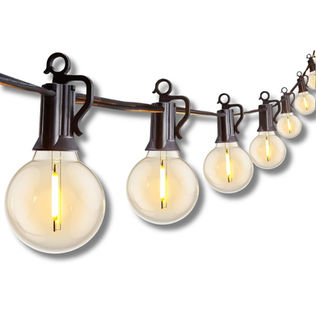Warm globe-style outdoor string lights designed to create a cozy and elevated patio atmosphere.