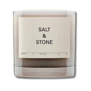 Minimal neutral candle in glass jar with clean modern packaging designed to elevate everyday home ambiance.