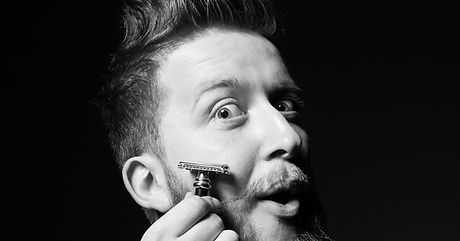 Man shaving face