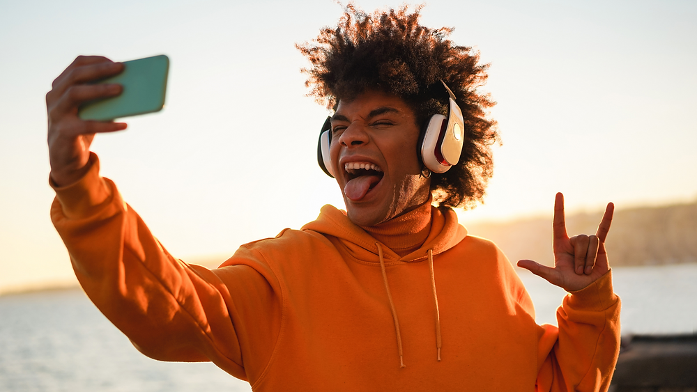 A man posing for a video