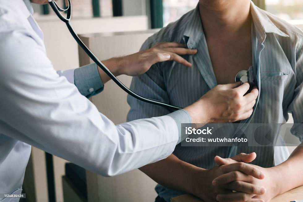 Doctor examining a patient's chest using a stethoscope