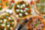 PIZZAS